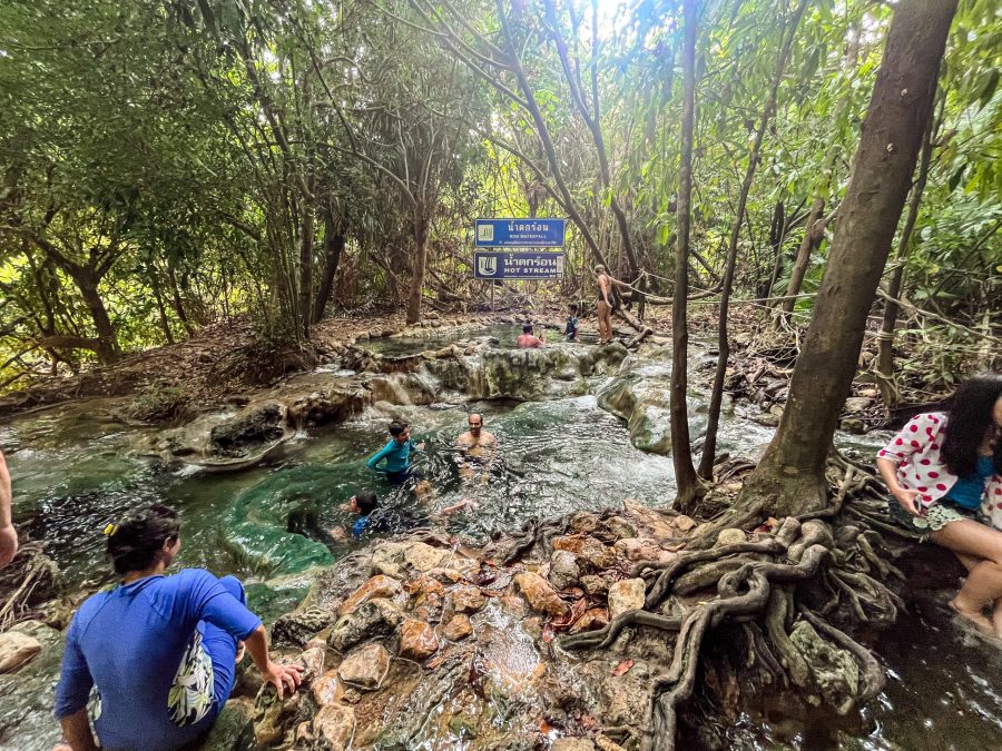 People enjoying a dip at Khlong Thom
