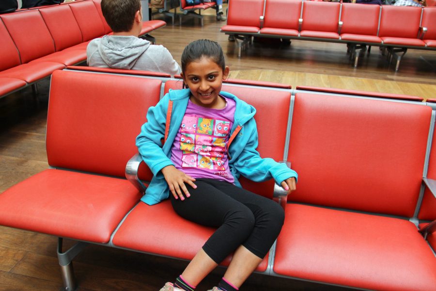 Airport With Kids - My daughter waiting in the seating area