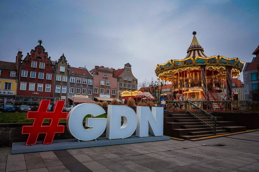 Carousel and sign of the city