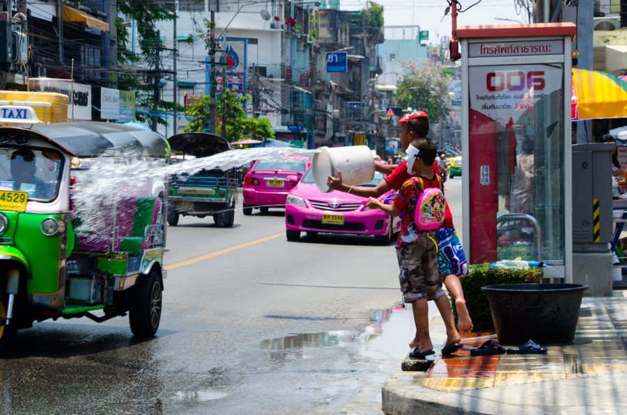 Kids spraying passers by in Bangkok
