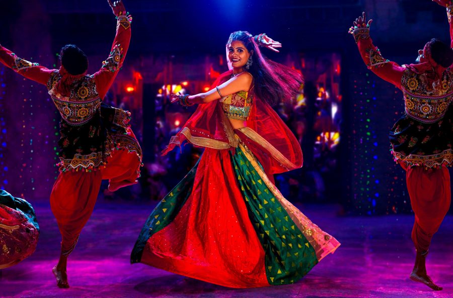 a woman doing Garba in Navratri