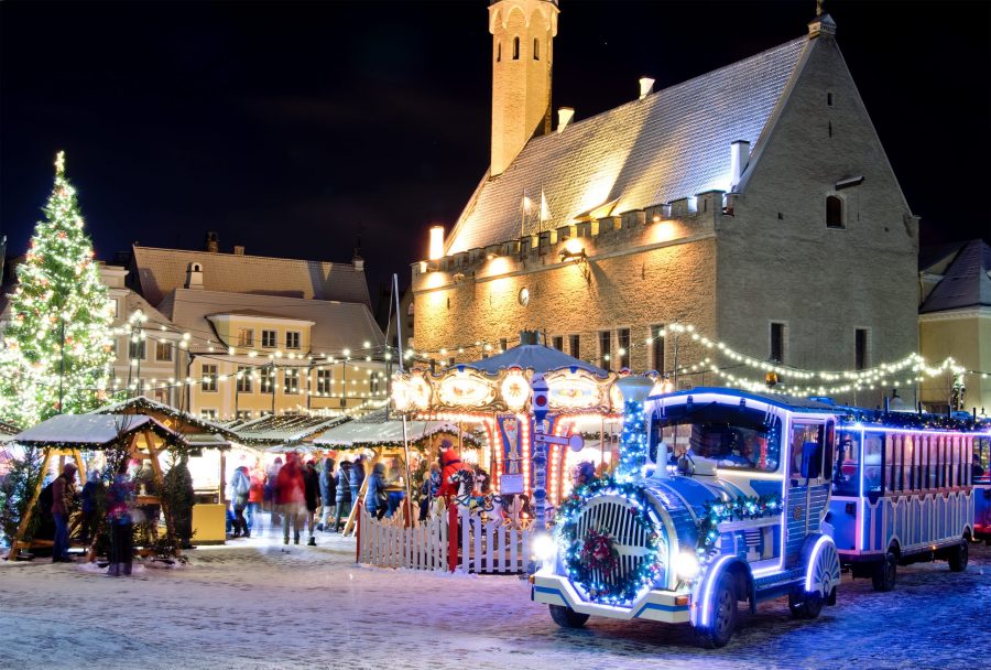Tallinn in Estonia with lights, festive stalls and holiday atmosphere.