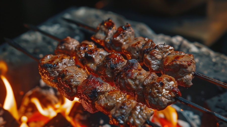 Spiced seekh kebabs served with onion rings and chutney