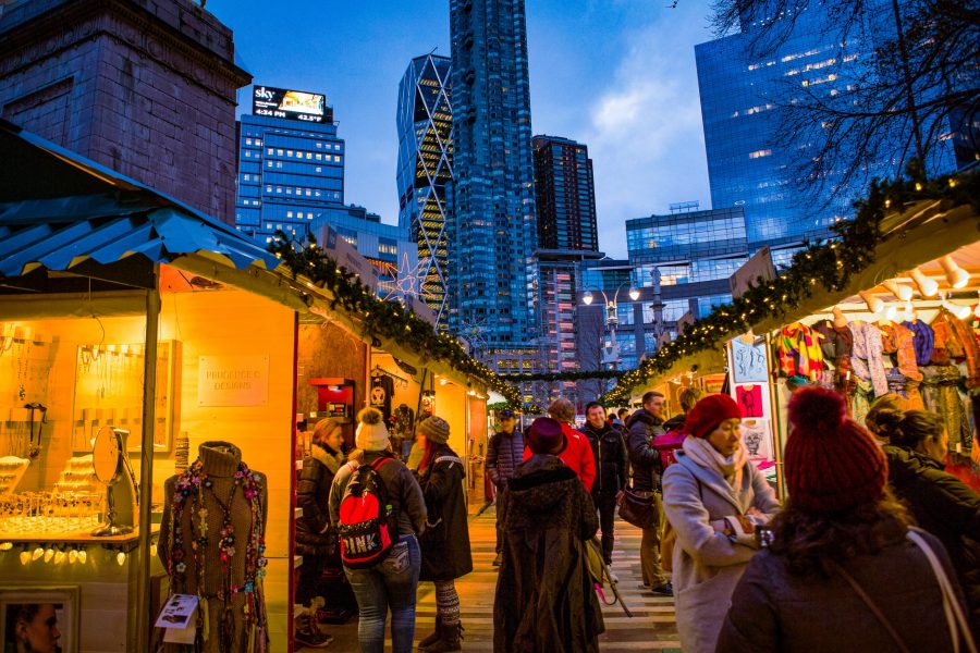 Columbus Circle Holiday Shops with decorated stalls and festive lights.
