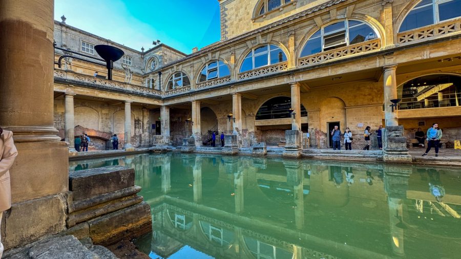 The Roman Baths in Bath with ancient stone architecture and water pools - one of the best day trips from London