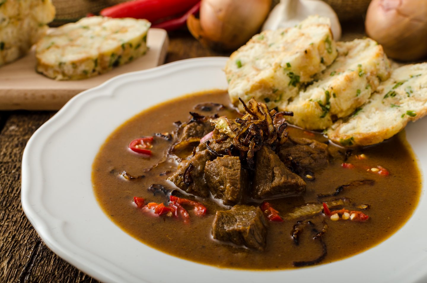 Classic Czech goulash with dumplings, delicious heavy food, homemade Karlovarsky dumplings