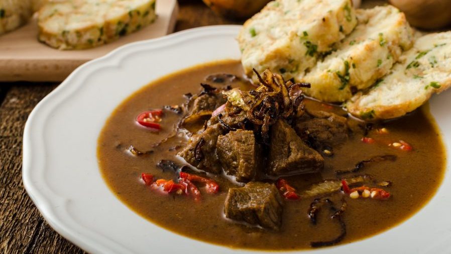 Classic Czech goulash with dumplings, delicious heavy food, homemade Karlovarsky dumplings