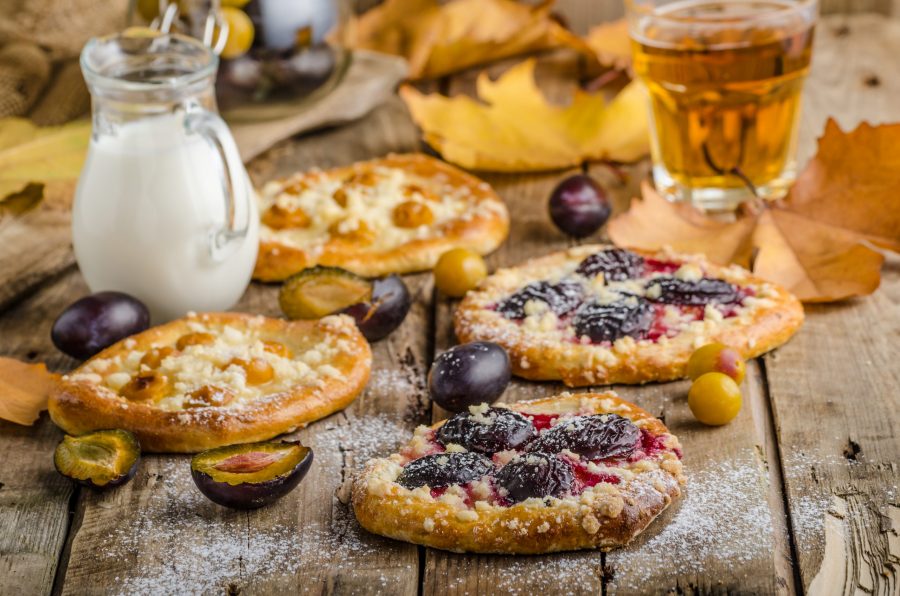 Traditional Czech cake with plums and prunes with milk