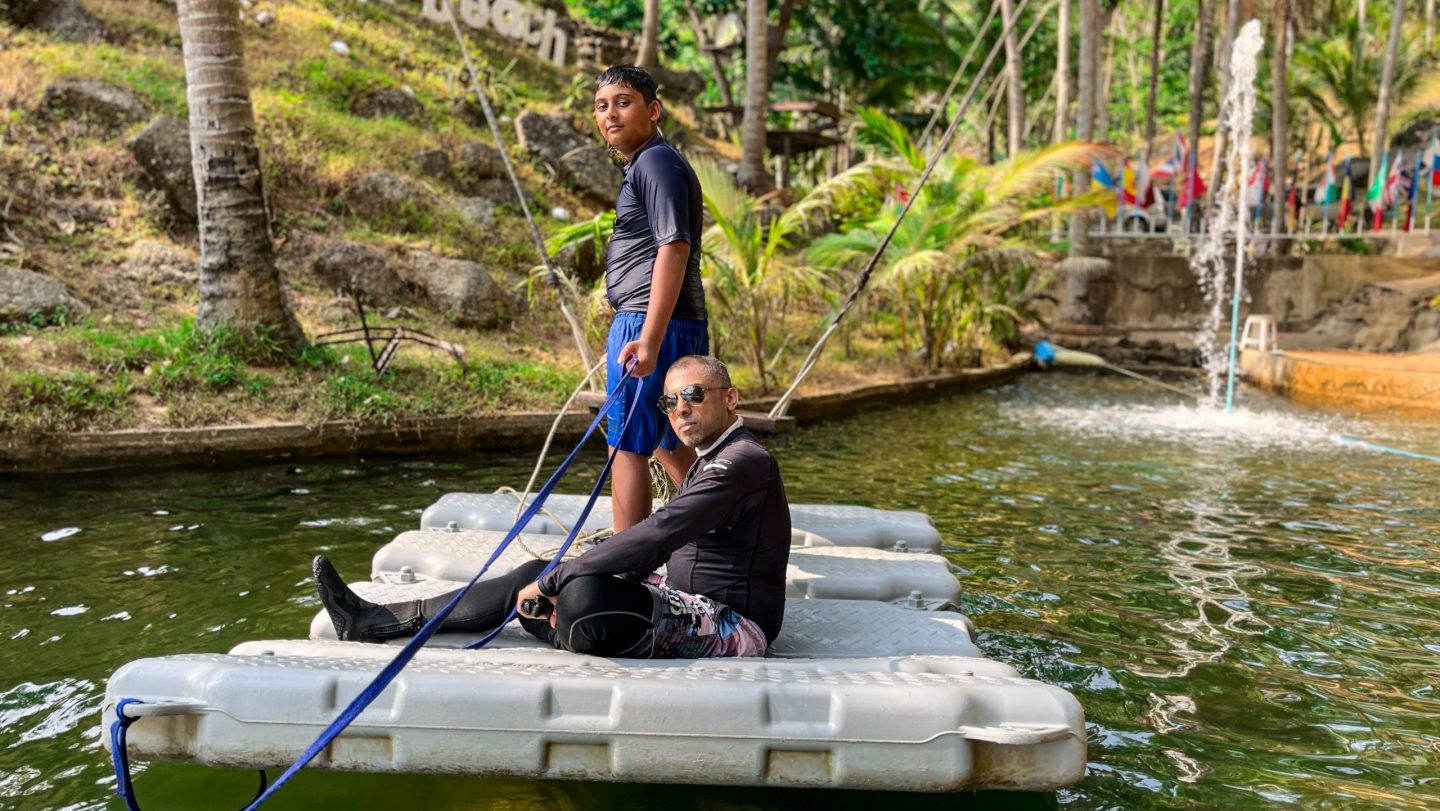 man and son on a boat