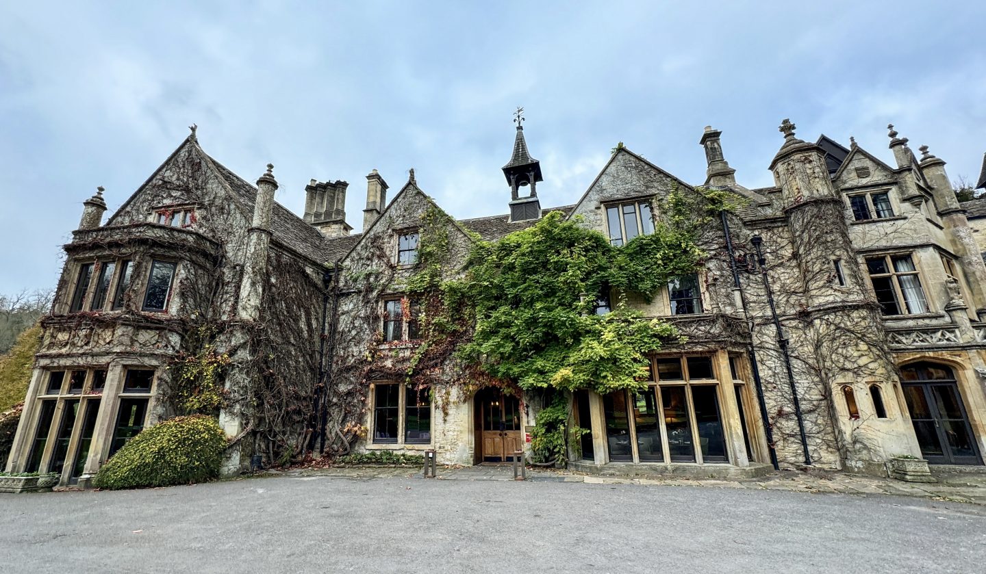 Exterior view of the historic 14th-century Manor House hotel in Castle Combe, a luxury base for an unplugged break.