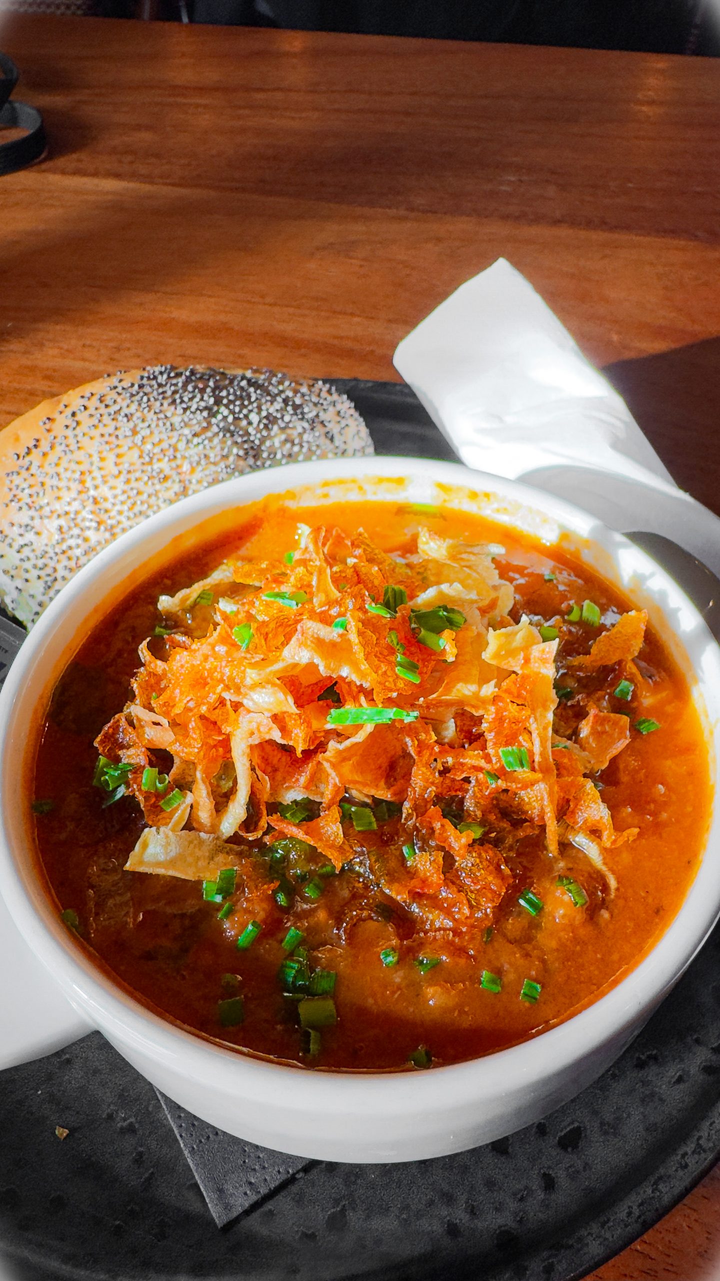 Lentil and vegetable soup in a bowl with a bread roll at the Yorkshire Bridge Inn in Bamford