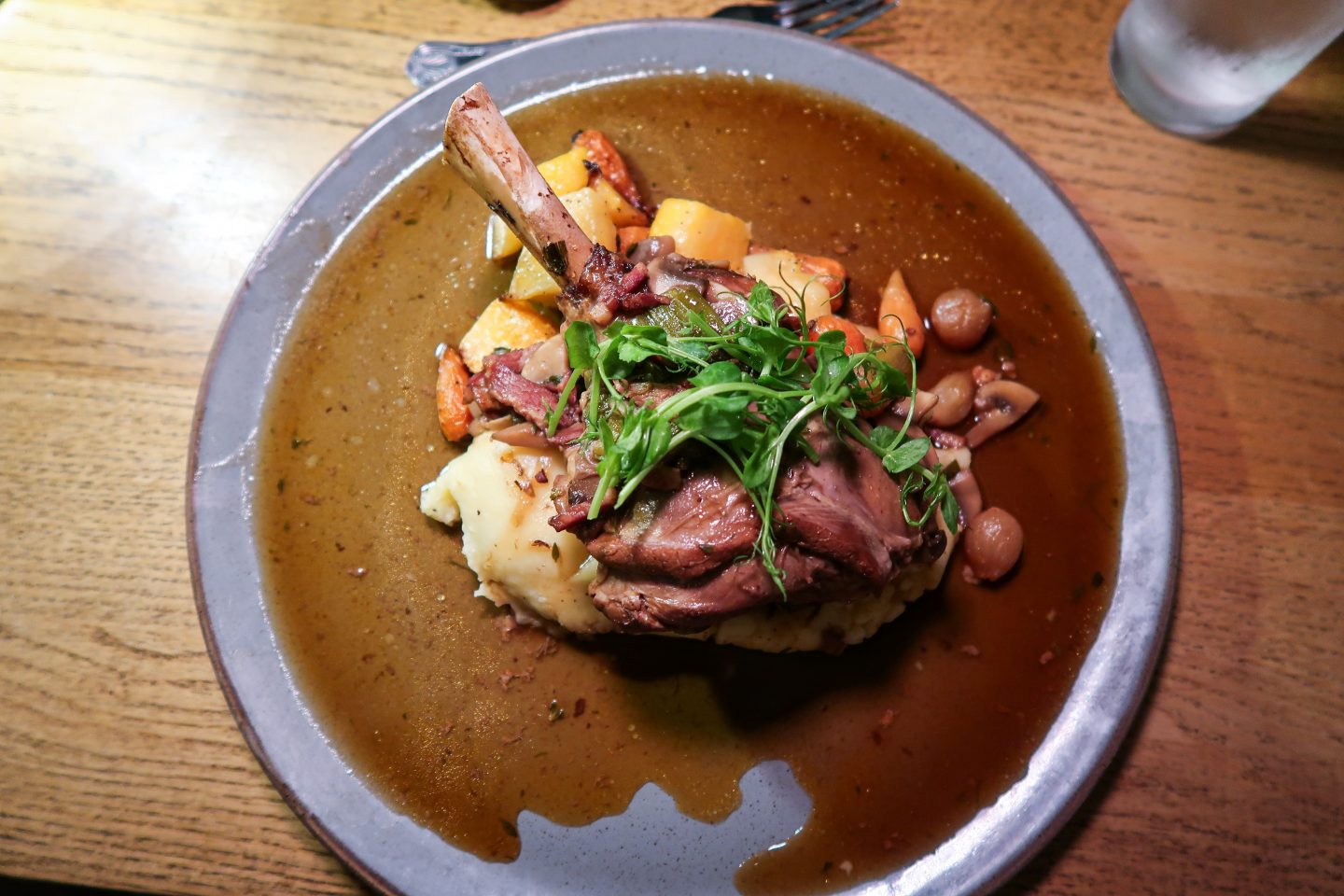Lamb shank on a plate at Oakhill Cromford