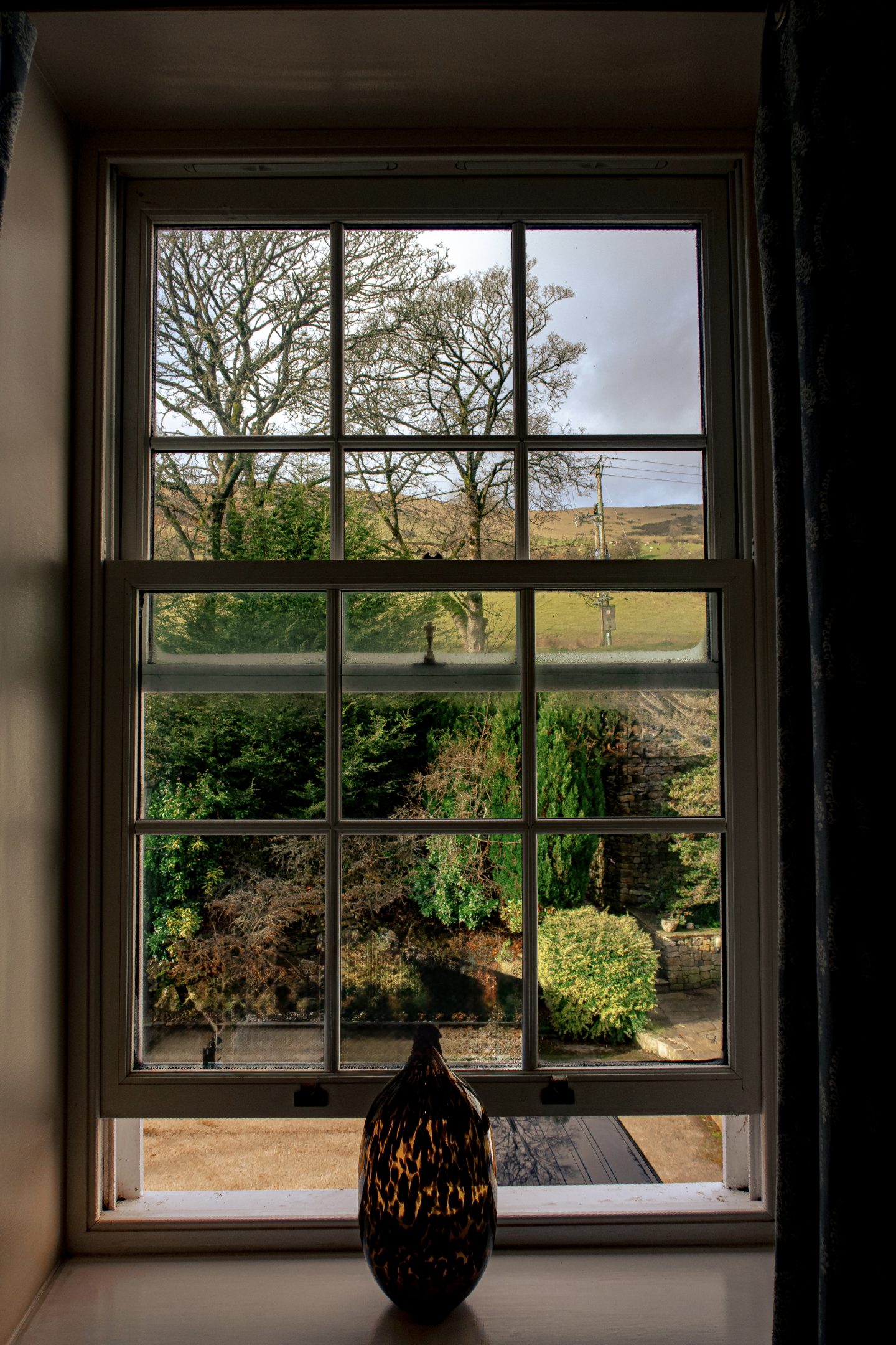 A view from the Losehill Hotel and Spa window overlooking rolling hills