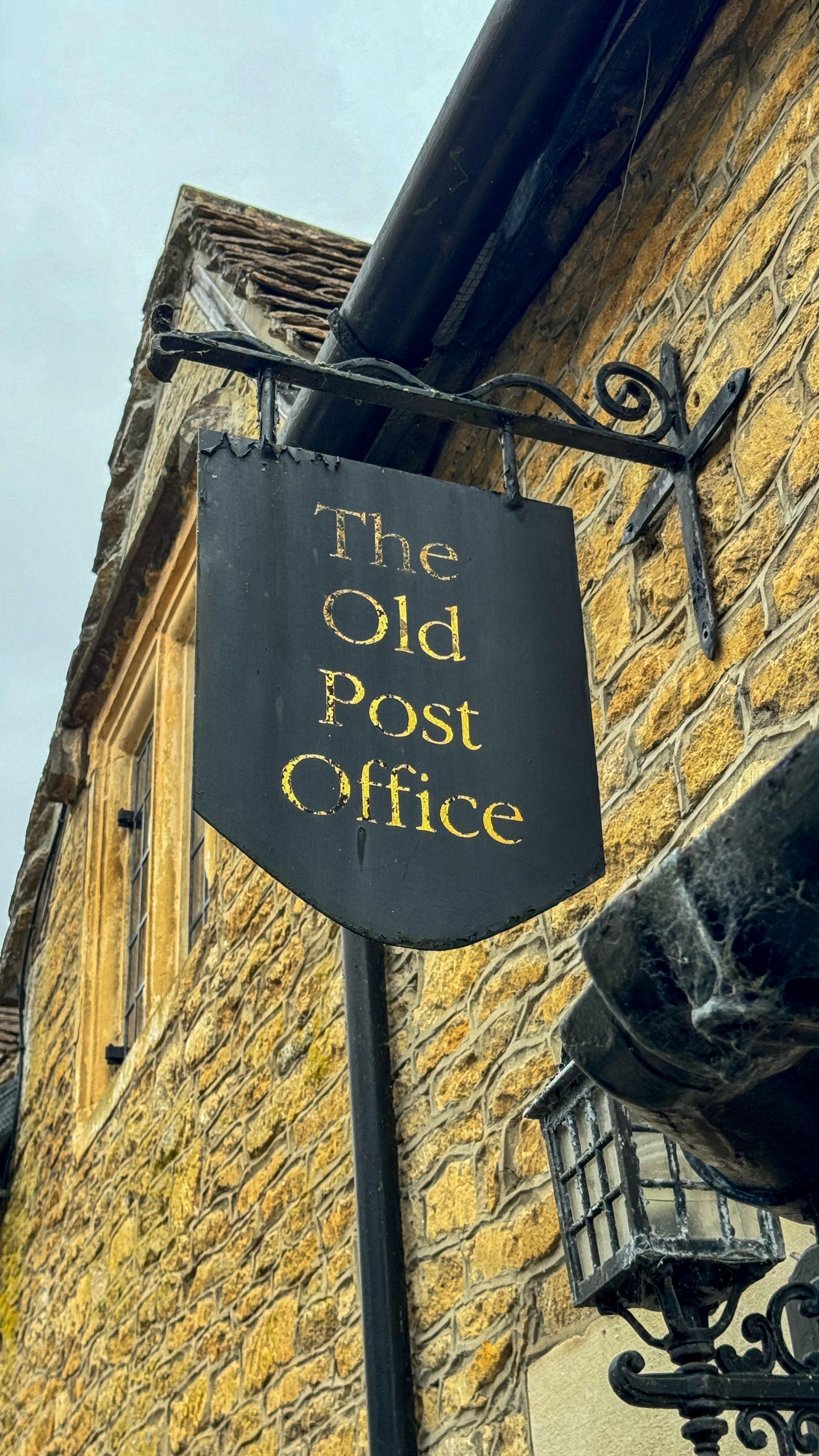 A sign of the Old Post Office in Castle Combe