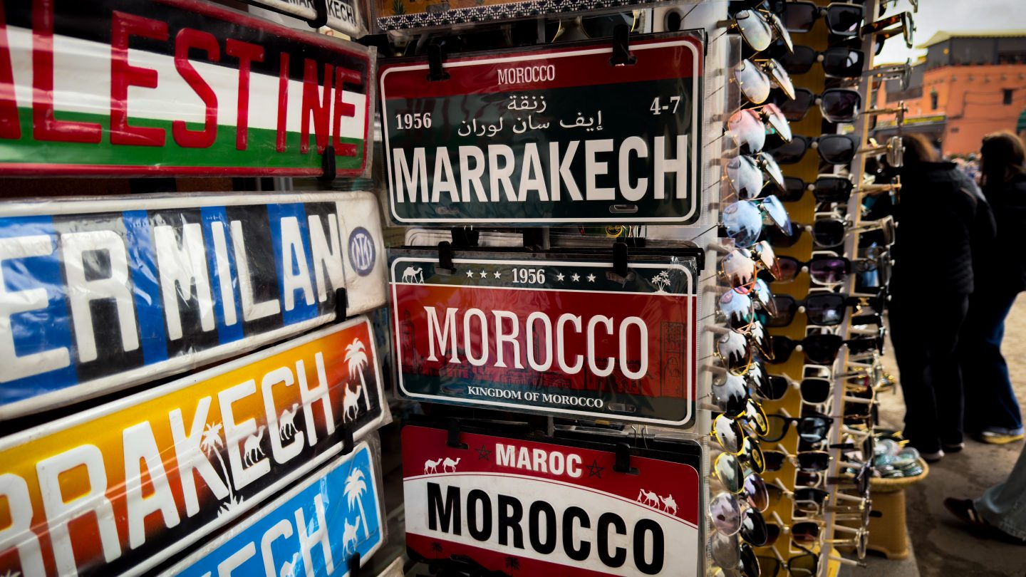 Signs in a souk that say Marrakech and Morocco