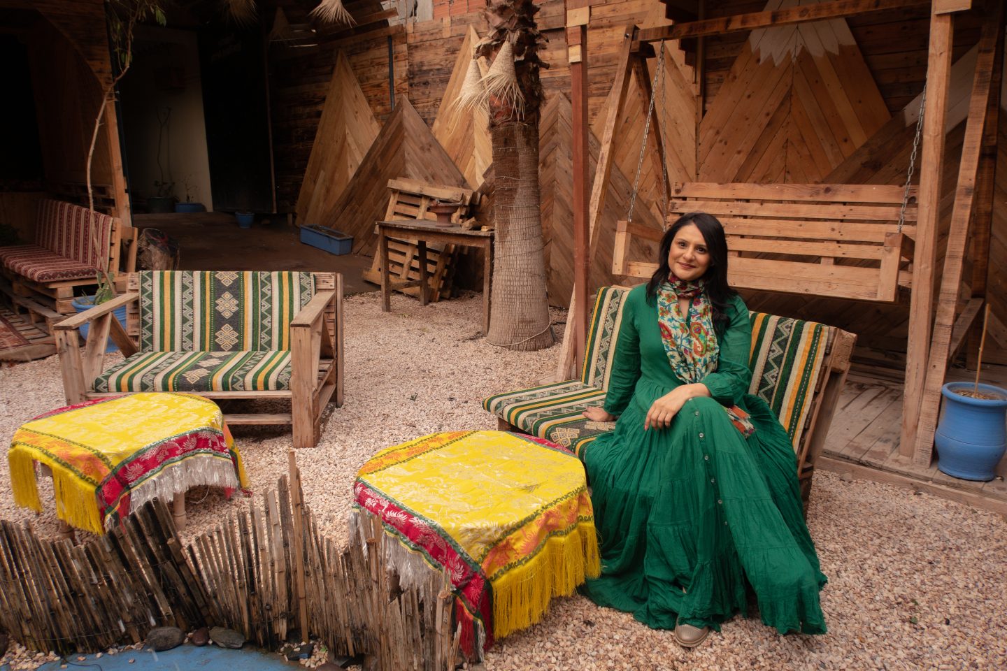 Woman sitting in an outdoor cafe