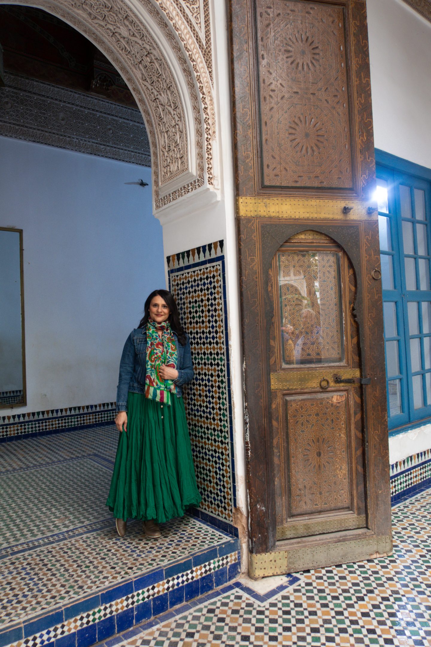 Woman standing in a doorway at Bahia Palace