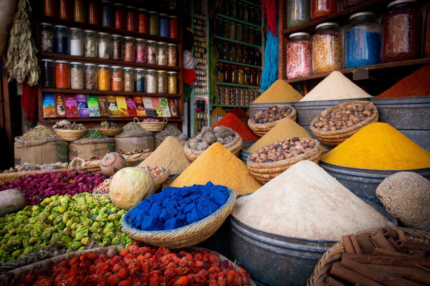 Colorful spices on display in a Marrakesh souk