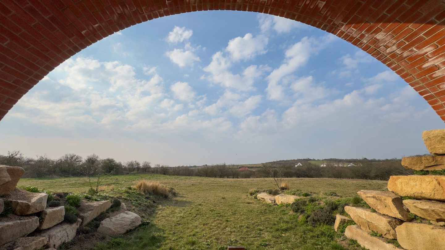 Hobbit style houses and a view over the vineyards in Thaya Winery
