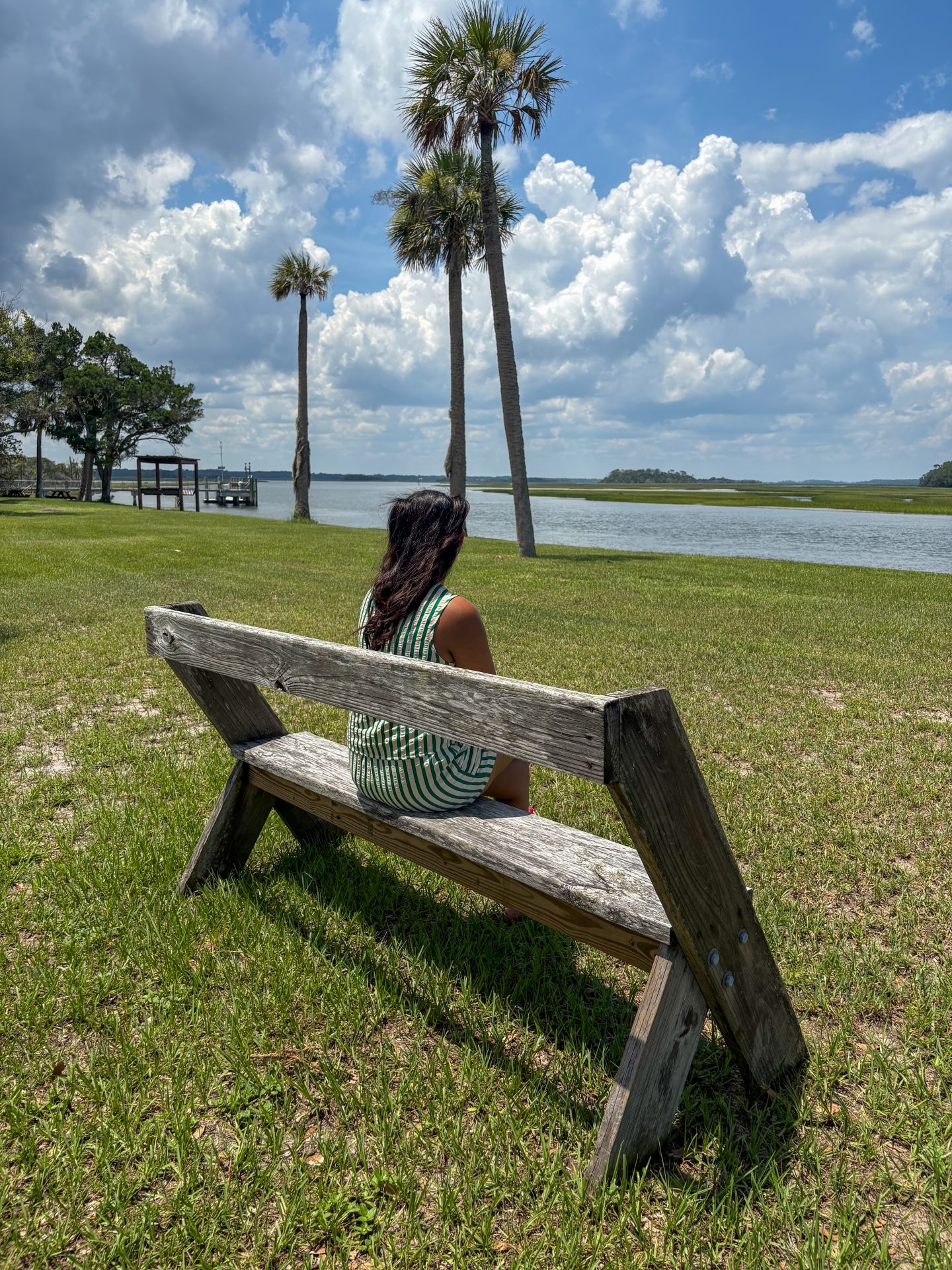 Woman sitting on a bench at the Kingsley Plantation in Jacksonville